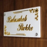 white home door name plate