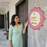 Personalized mandala nameplate mounted at home entrance