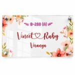 Floral name plate for home with Vineet and Ruby couple names and house number B-288 on clear acrylic